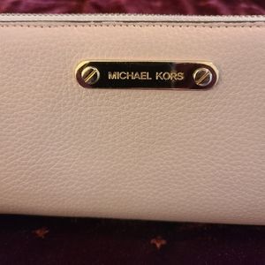 Michael Kors light pink wallet